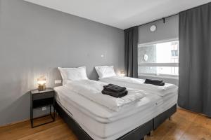 Postel nebo postele na pokoji v ubytování Tomas Luxury Apartments