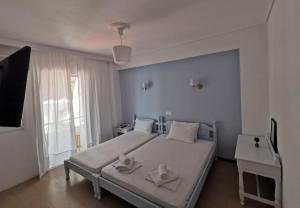Postel nebo postele na pokoji v ubytování Hotel Rania