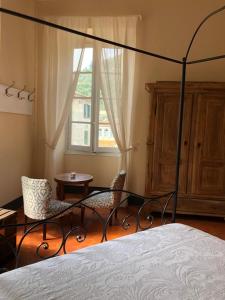 En eller flere senger på et rom på BB Palazzo Doria