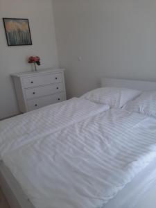 Posteľ alebo postele v izbe v ubytovaní Apartmán Pri Jazere - Slnečné jazerá JUH