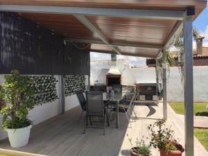 A balcony or terrace at Chalet Santi Playa de la Barrosa