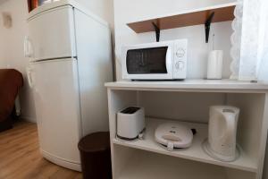Kuchyňa alebo kuchynka v ubytovaní Apartments Onorina