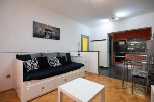 Kuchyňa alebo kuchynka v ubytovaní Apartments Onorina