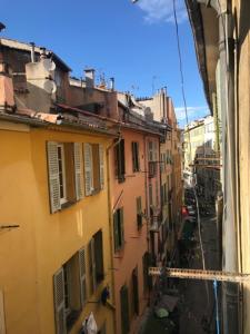 a view of an alley from a building at Cosy sweet space in paradise - 5min from the beach in Nice