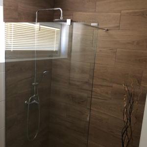 Kúpeľňa v ubytovaní Bier-Lak Apartman House 71