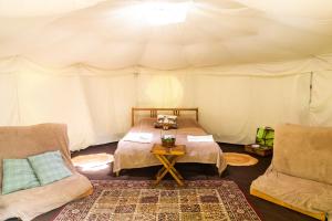 A bed or beds in a room at DGG Woodland Escape