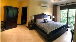 Postel nebo postele na pokoji v ubytování Macaws Ocean Club Apartamento # 18