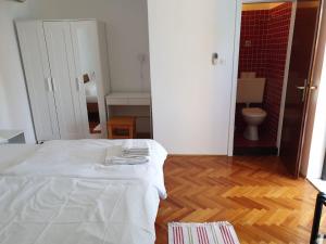 Postel nebo postele na pokoji v ubytování Apartman David