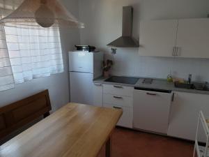 Kuchyň nebo kuchyňský kout v ubytování Apartman David