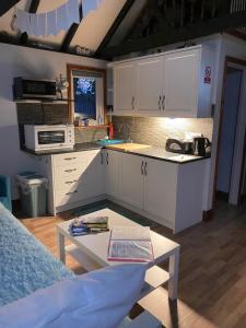 A kitchen or kitchenette at Saving Grace 