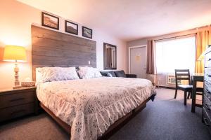 Postel nebo postele na pokoji v ubytování Scenic Inn