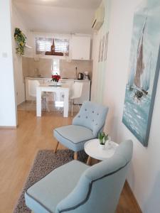 Kuchyň nebo kuchyňský kout v ubytování Apartments & Rooms Vitt