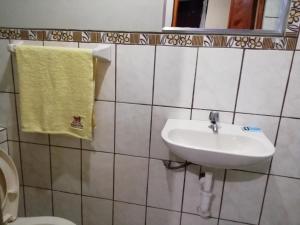 Koupelna v ubytování Hostal Sumak'usi