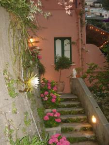 a row of stairs leading up to a balcony at Villa Maria Antonietta in Positano