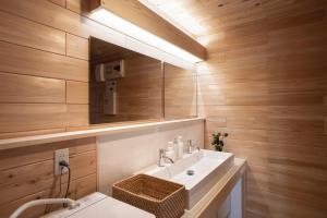 a bathroom with a sink and a mirror at Nikko, Matsubara no Yado - Vacation STAY 31914v in Nikko