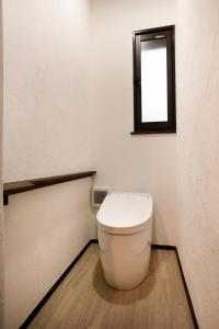 a bathroom with a toilet and a window at Nikko, Matsubara no Yado - Vacation STAY 31914v in Nikko