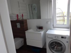 Kúpeľňa v ubytovaní Apartament SOLEIL Kołobrzeg