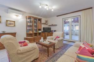 TV a/nebo společenská místnost v ubytování Apartments Istra Croatia