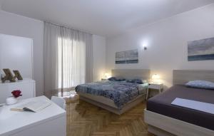 Postel nebo postele na pokoji v ubytování Apartments Istra Croatia