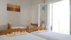 Postel nebo postele na pokoji v ubytování Accommodation Drasko