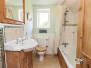 Koupelna v ubytování Wood Glen Cottage + 14 fotografií