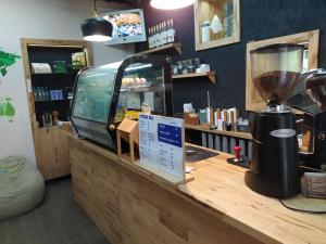 a counter in a store with a blender on it at Hostel Svit Hub in Kamianets-Podilskyi