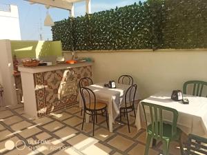 Reštaurácia alebo iné gastronomické zariadenie v ubytovaní B&B L'Antica Dimora ...e dei mestieri