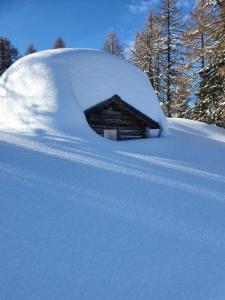 Haus Enzian Apartments durante l'inverno