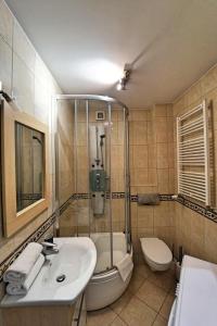 Kúpeľňa v ubytovaní Apartamenty EverySky - Skalna 32