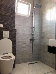 Koupelna v ubytování Hotel Dardani