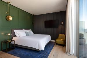 Ink Hotel Tel Aviv客房内的一张或多张床位