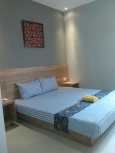 Postel nebo postele na pokoji v ubytování 5Residence