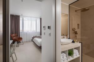 Posteľ alebo postele v izbe v ubytovaní Villa Biancomar