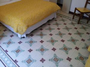 A bed or beds in a room at Antico Borgo