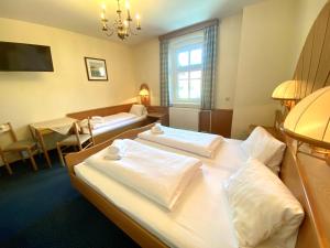 Hotel Gasthof Stenitzer客房内的一张或多张床位