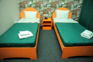 
Кровать или кровати в номере Lite Hotel Волгоград
