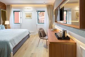 Postel nebo postele na pokoji v ubytování Geremia Luxury Rooms