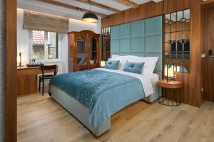 Postel nebo postele na pokoji v ubytování Geremia Luxury Rooms