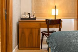 Postel nebo postele na pokoji v ubytování Geremia Luxury Rooms