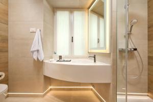 Koupelna v ubytování Geremia Luxury Rooms