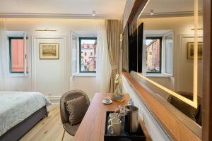 Postel nebo postele na pokoji v ubytování Geremia Luxury Rooms