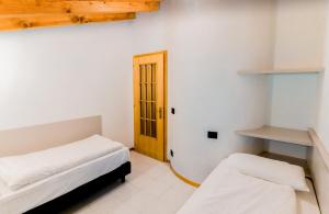 Postel nebo postele na pokoji v ubytování Casa Alberta
