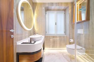 Koupelna v ubytování Geremia Luxury Rooms