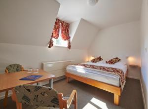 Posteľ alebo postele v izbe v ubytovaní Hotel Mezní Louka