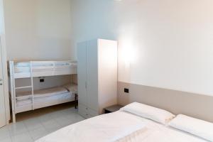 Postel nebo postele na pokoji v ubytování Casa Alberta