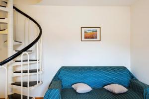 Postel nebo postele na pokoji v ubytování Casa Alberta