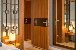 Postel nebo postele na pokoji v ubytování Geremia Luxury Rooms