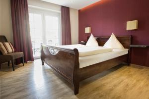 Postel nebo postele na pokoji v ubytování Hotel Filla Andre