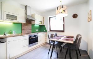 Kuchyň nebo kuchyňský kout v ubytování Modernes Ferienhaus Mit Garten