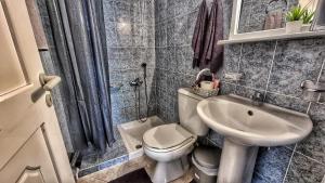Ein Badezimmer in der Unterkunft BeachHouse